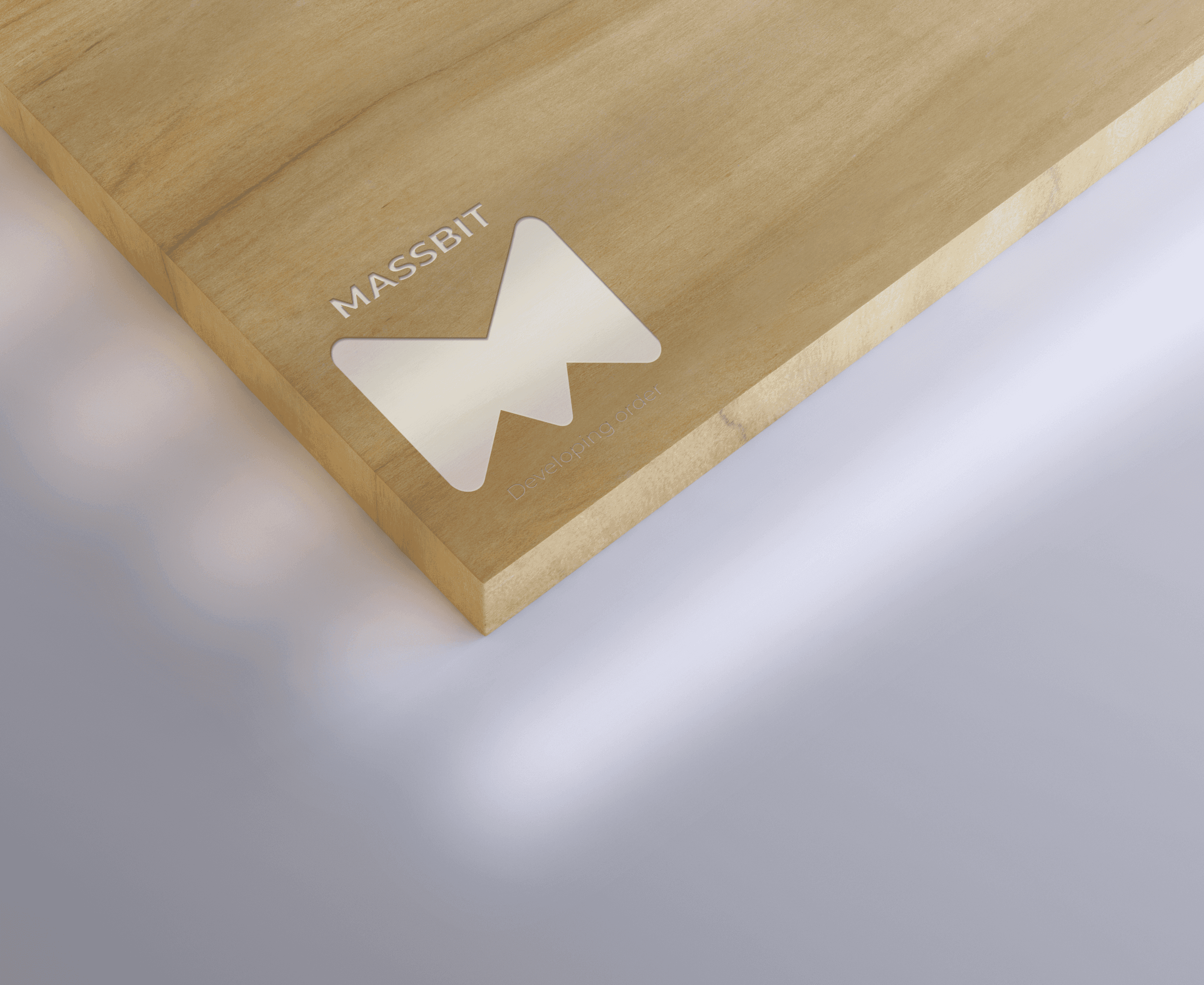 Massbit logo engraved on wood